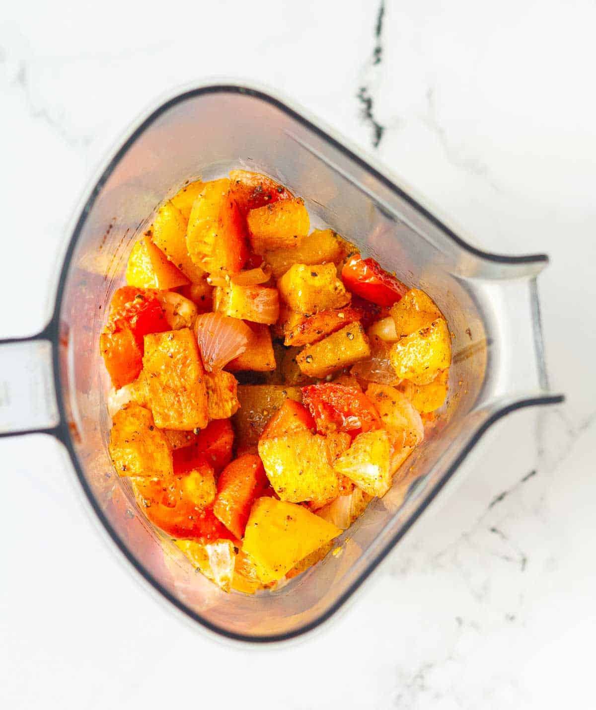 roasted vegetables in a blender jar.