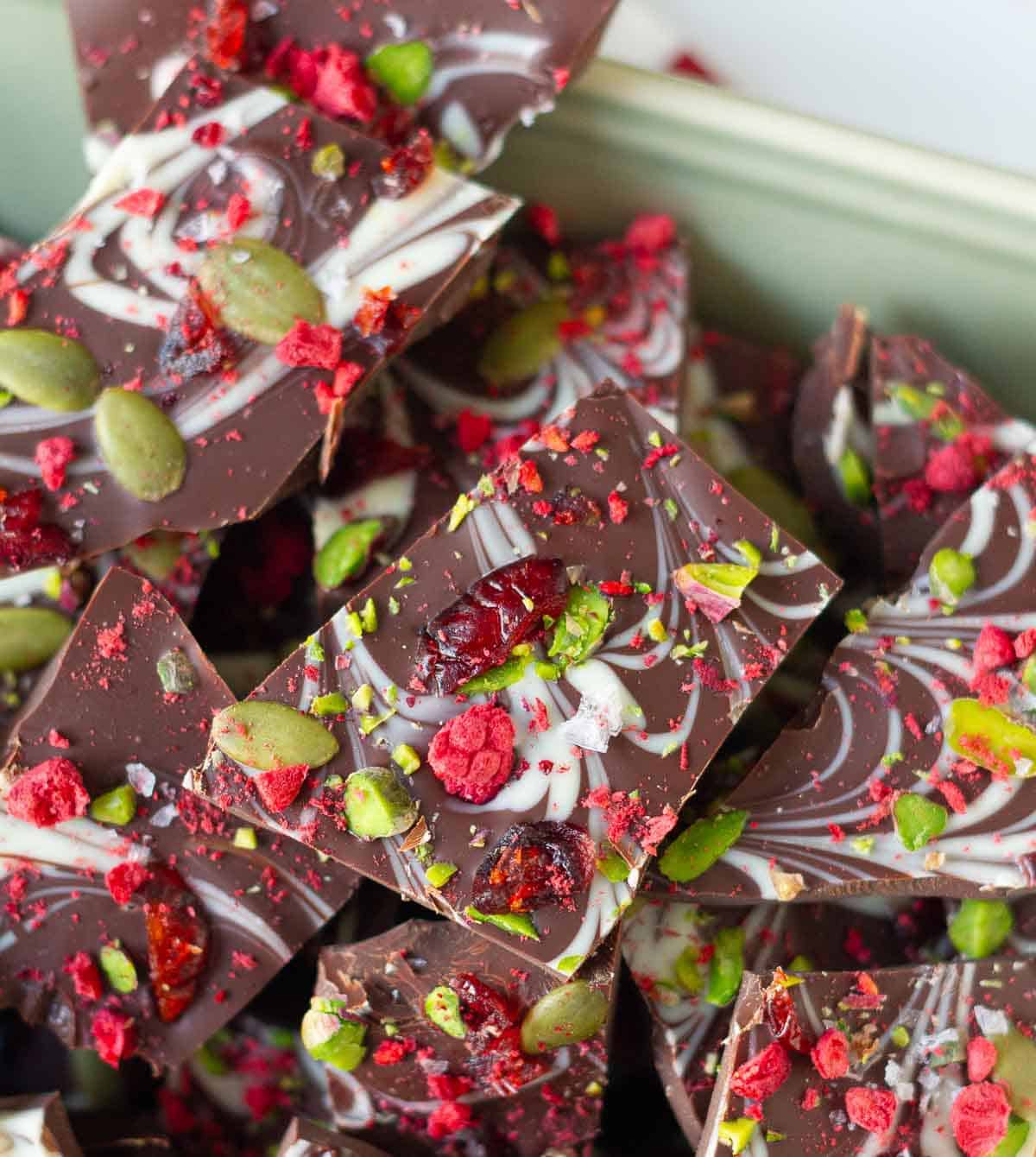 chocolate bark pieces studded with cranberries, pumpkin seeds, freeze-dried raspberries, and pistachios.