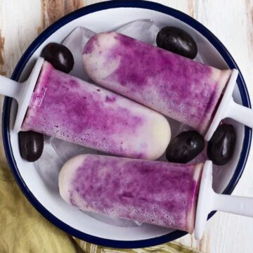 Jamun Yogurt Popsicles in a bowl.