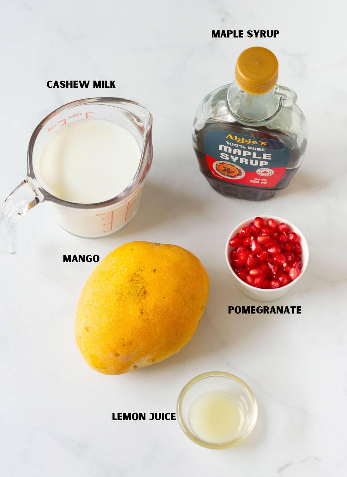 Ingredients for making mango cashew popsicles.