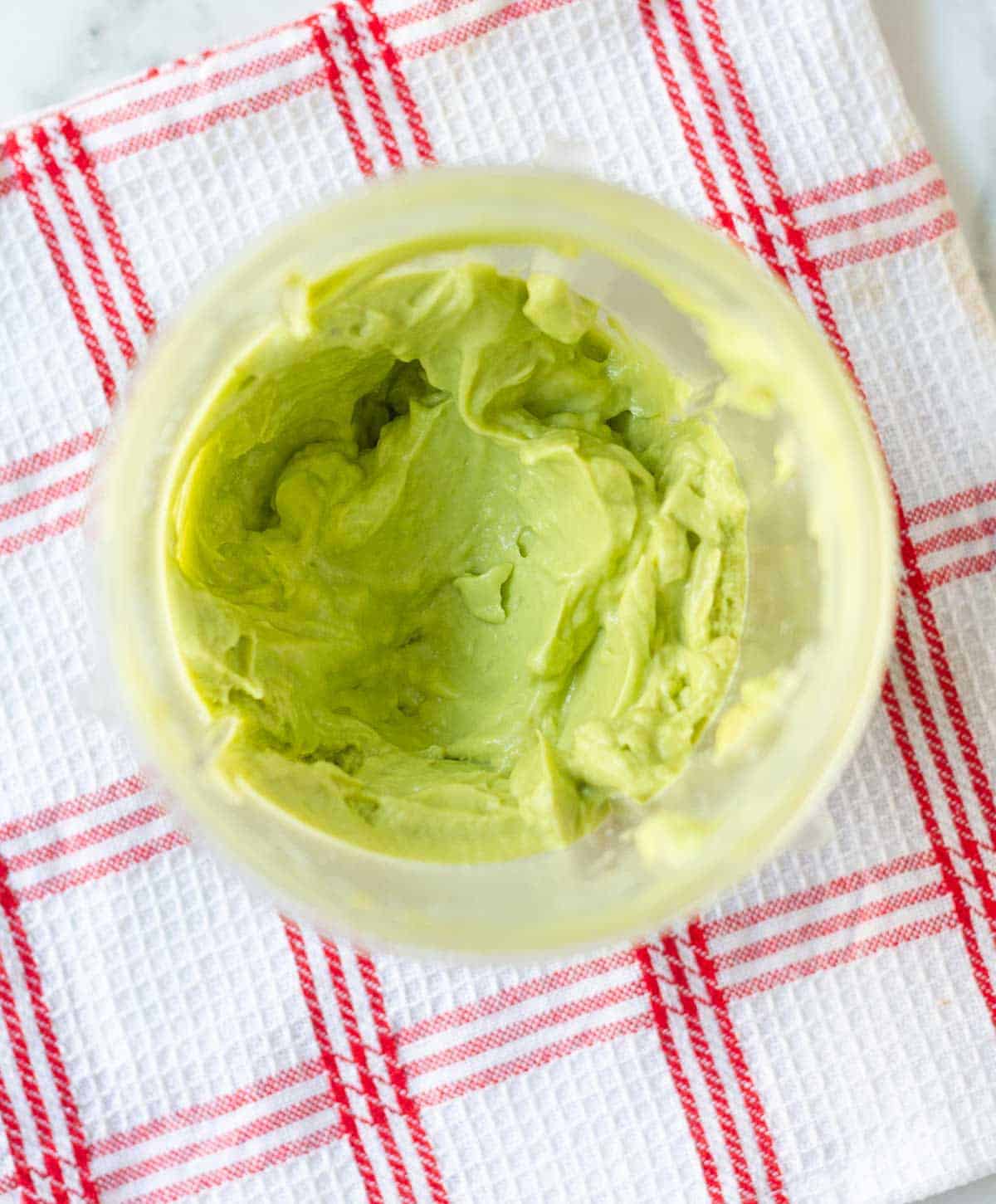 pureed avocado in a blender jar.