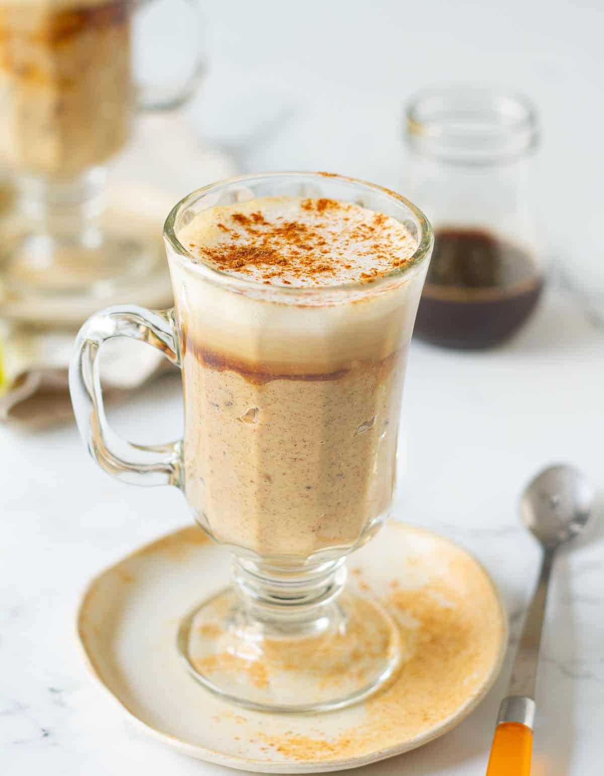 coffee oatmeal latte topped with cinnamon powder.
