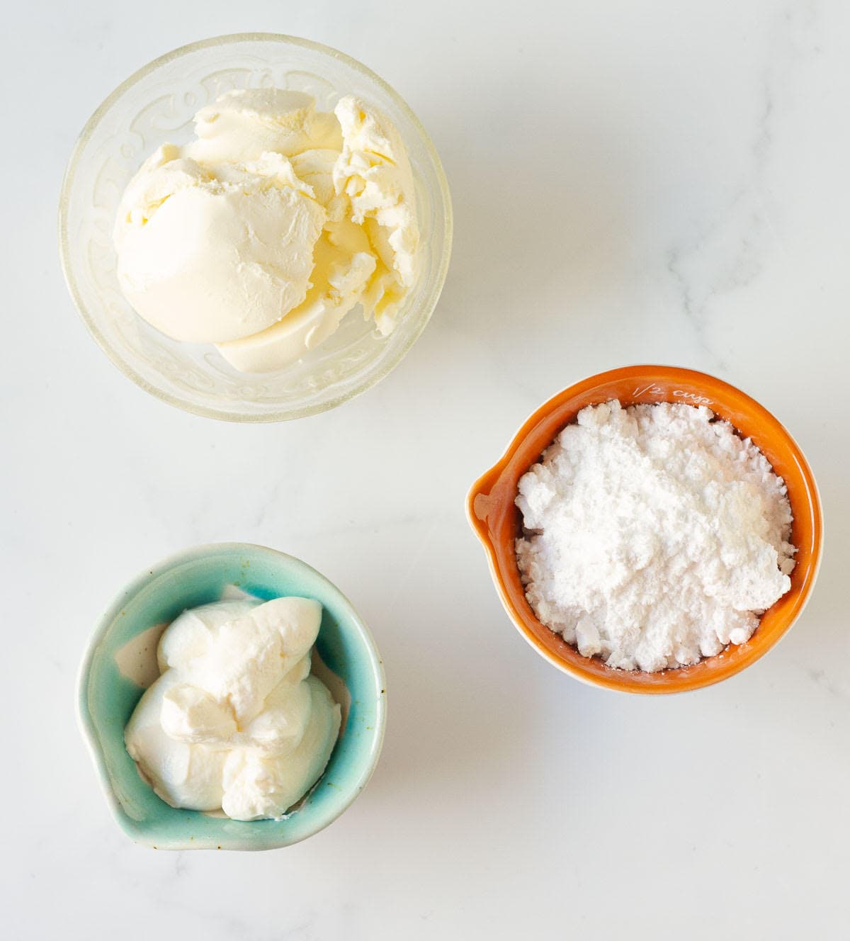 Ingredients for making cream cheese frosting.