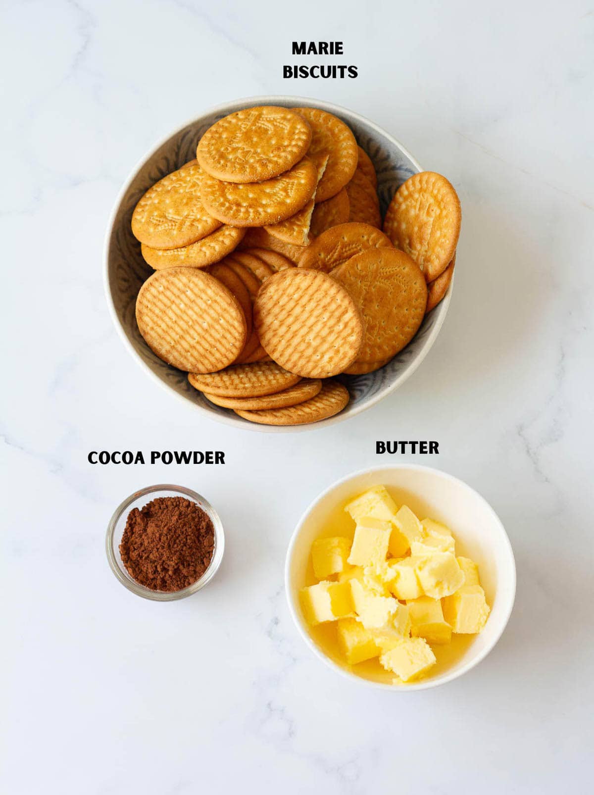 Cookies, cocoa powder, and butter for making cookie crust.
