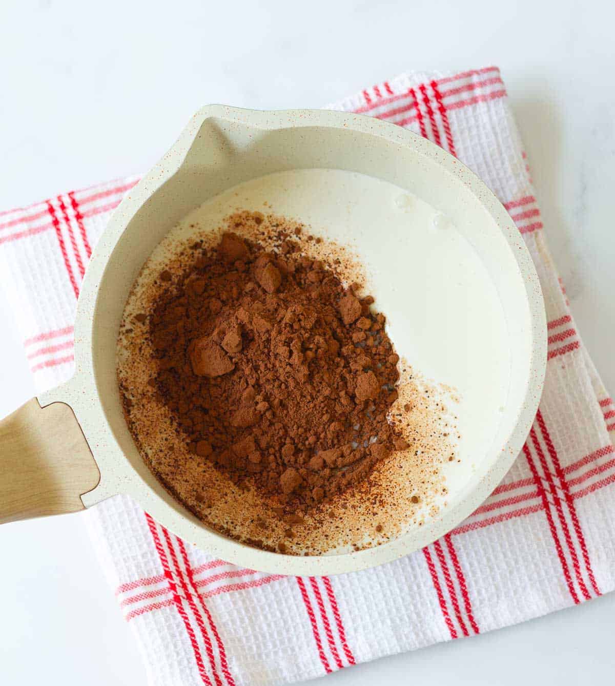 cream, sugar,and cocoa powder in a saucepan.