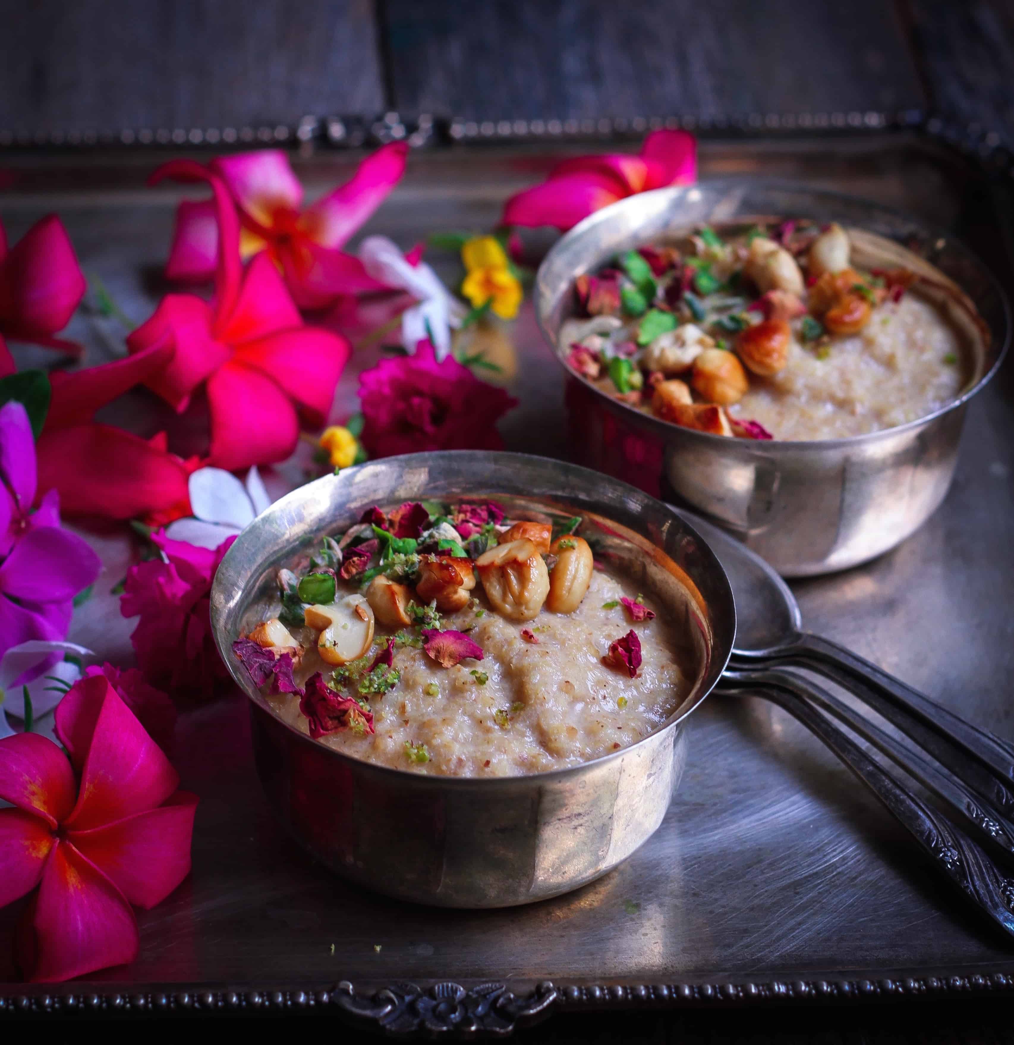 Almond Millet Kheer (Pudding) | healthy refined sugarfree glutenfree vegan friendly recipe Almond Millet Kheer (Pudding) in 2 small bowls with flowers and spoons.