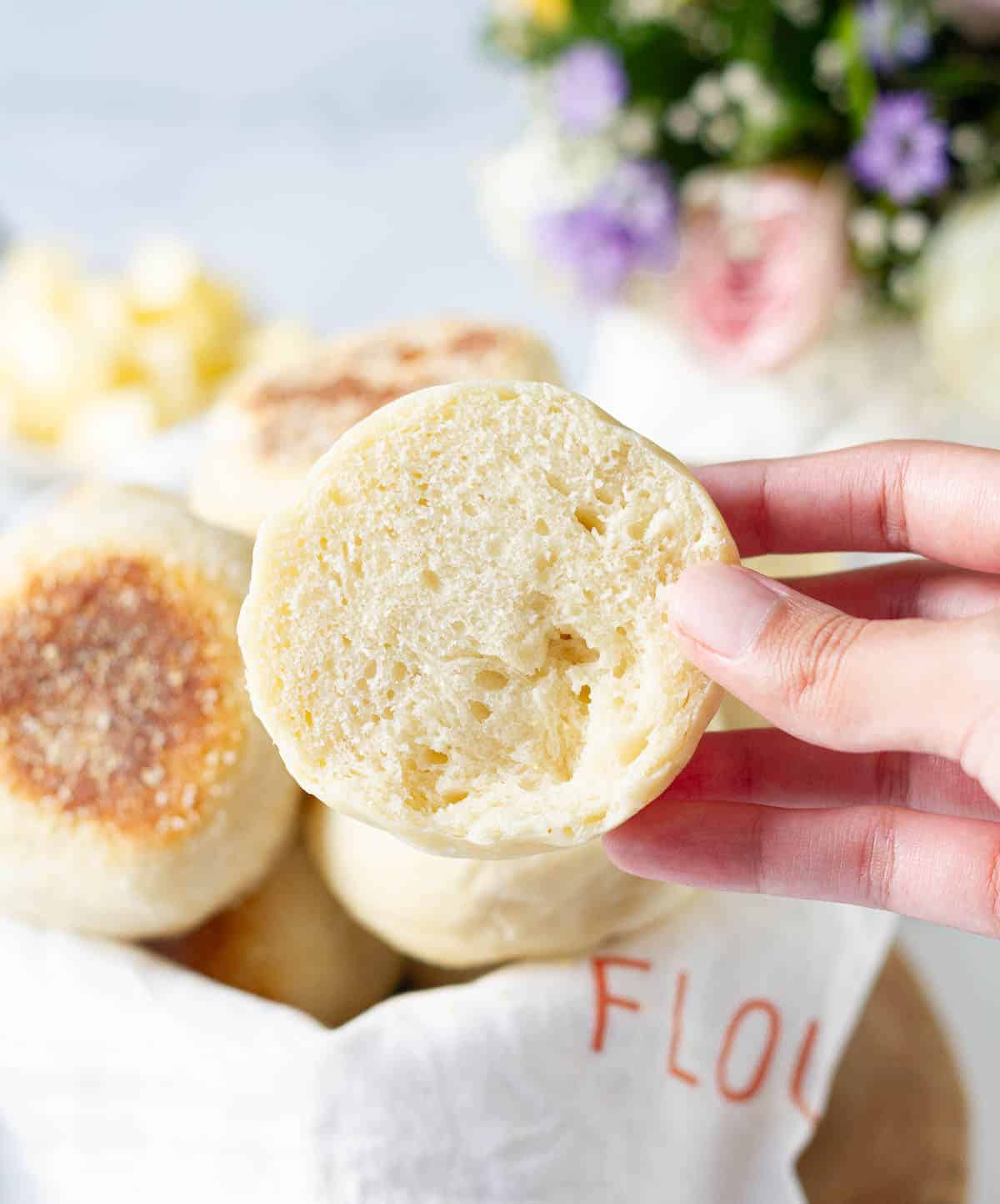 An English muffin cut in half to show the texture.