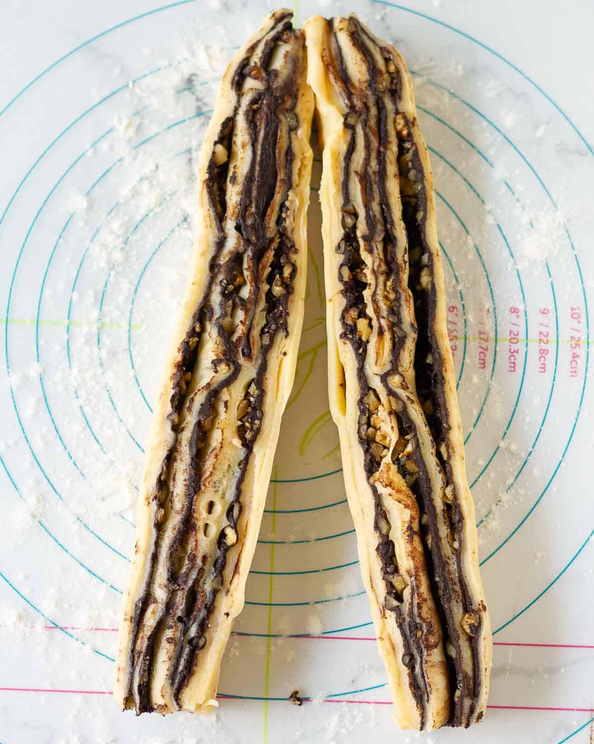 dough roll cut lengthways into two.