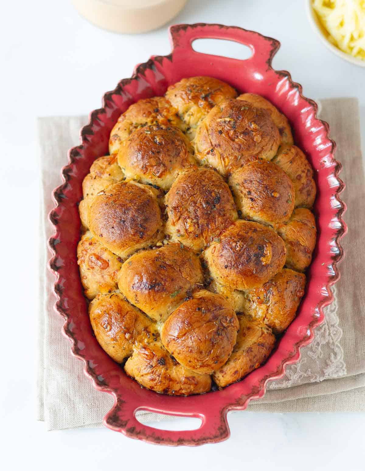 Bubble bread in a baking dish.