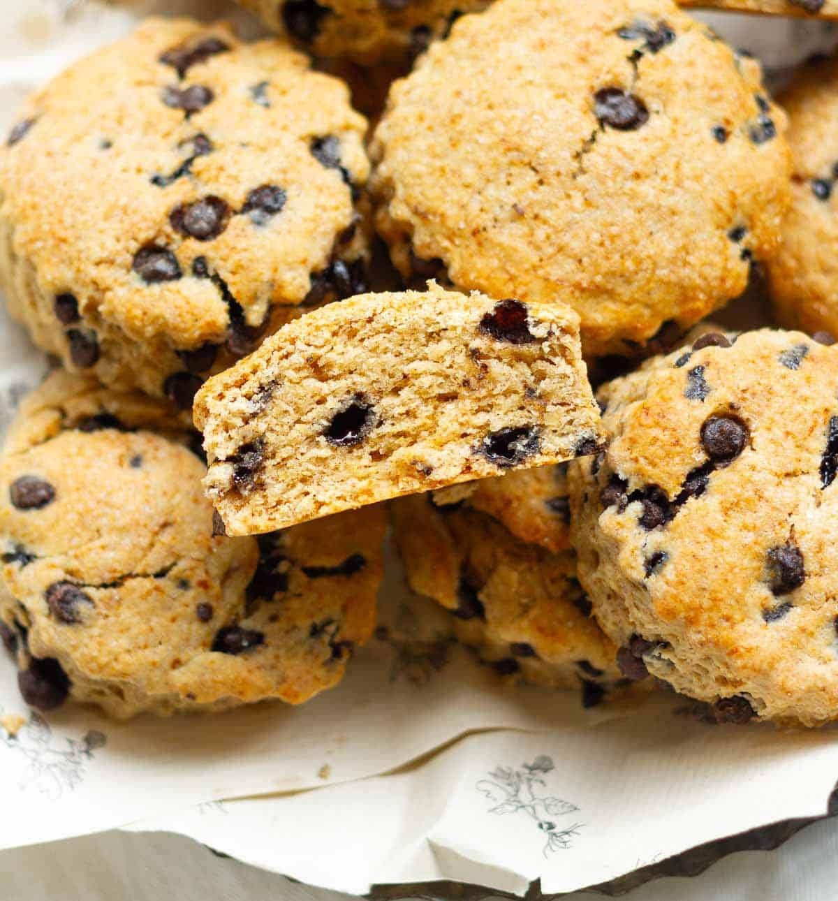 Scones on a tray with one half scone to show the texture.