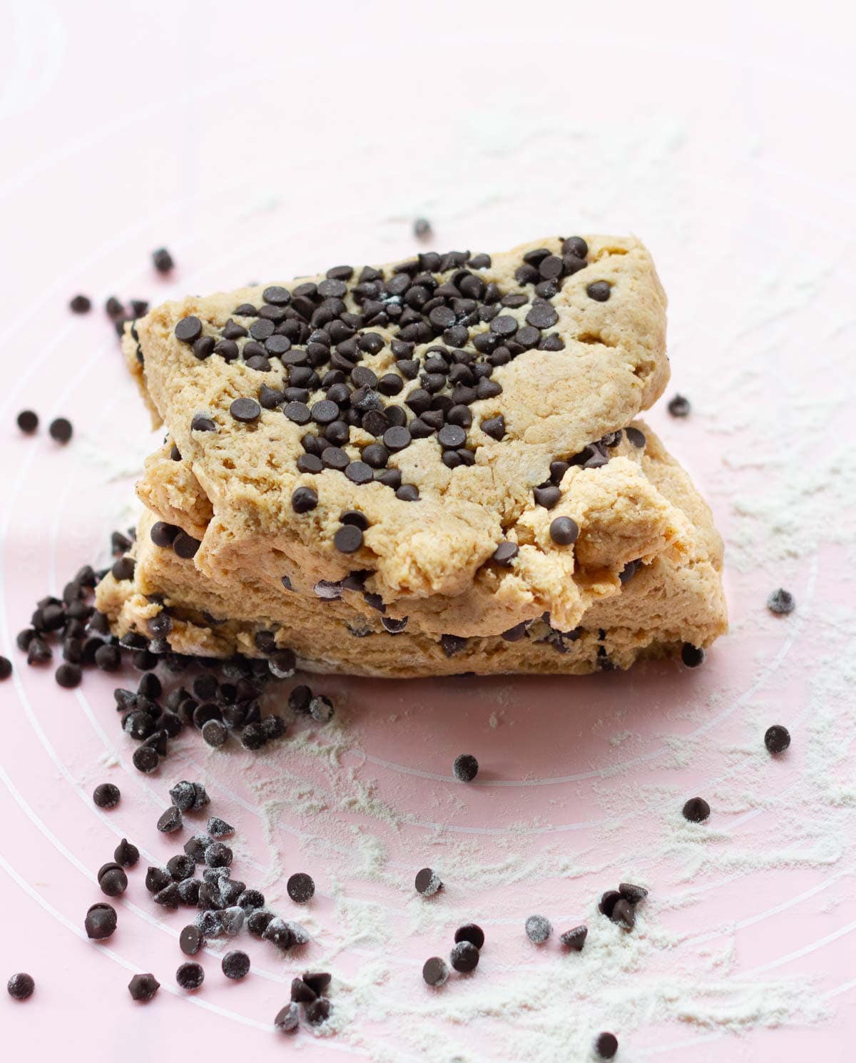 dough with chocolate chips cut in half and placed on top of each other.