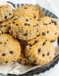 Cinnamon scones with chocolate chips on a tray.