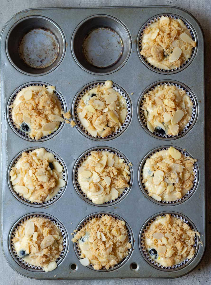 Muffin batter in muffin tray.