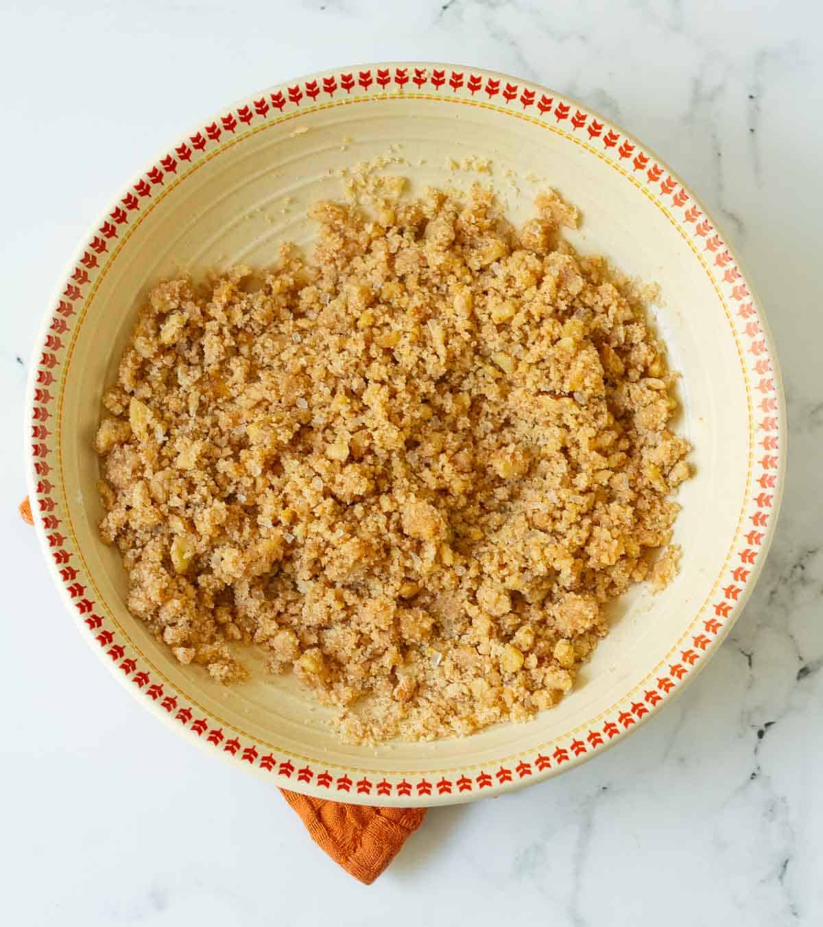Cinnamon walnut streusel in a bowl.