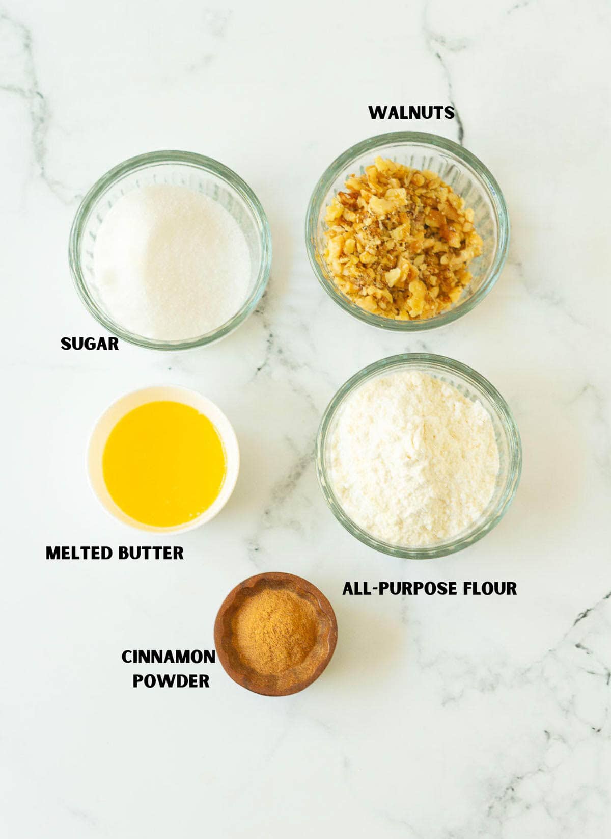 Labelled ingredients for making streusel for a cake.
