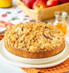 Apple crumb cake on a platter.