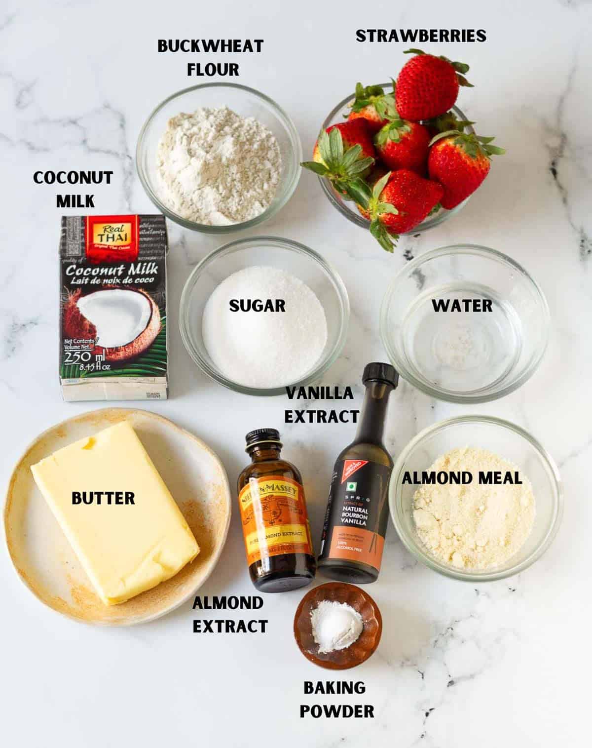 Labelled ingredients for making strawberry frangipane tart.