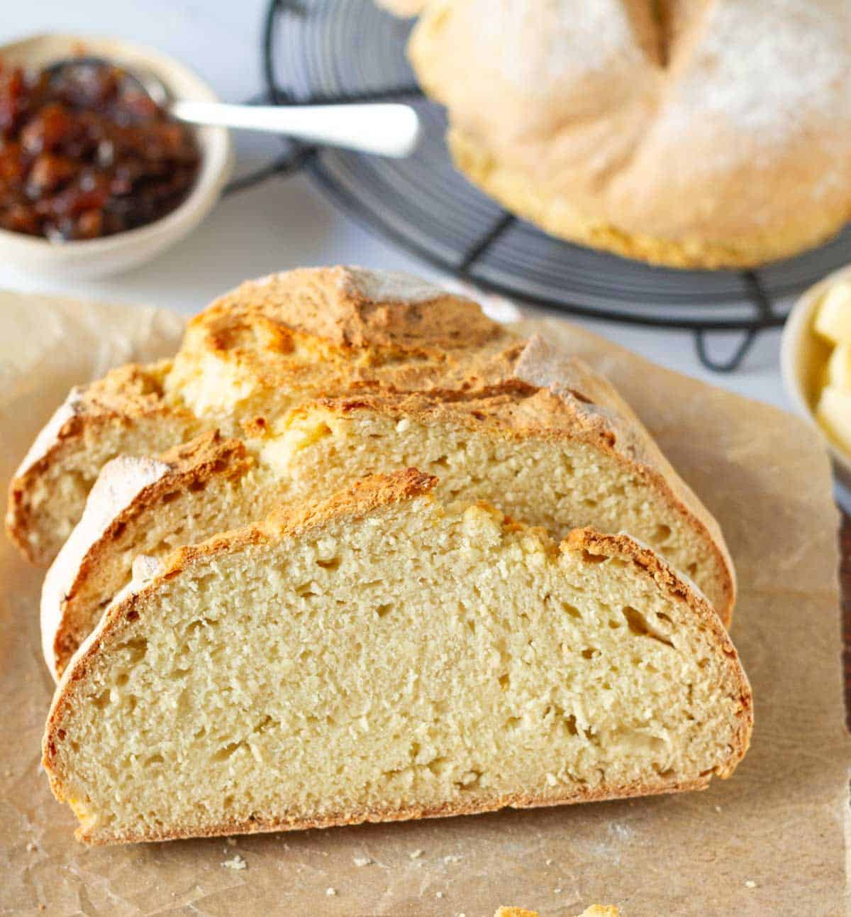 Sliced bread on a board to show the texture.