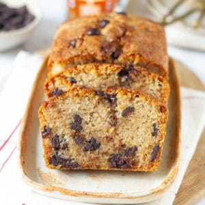 Sliced chocolate chip cake on a platter.