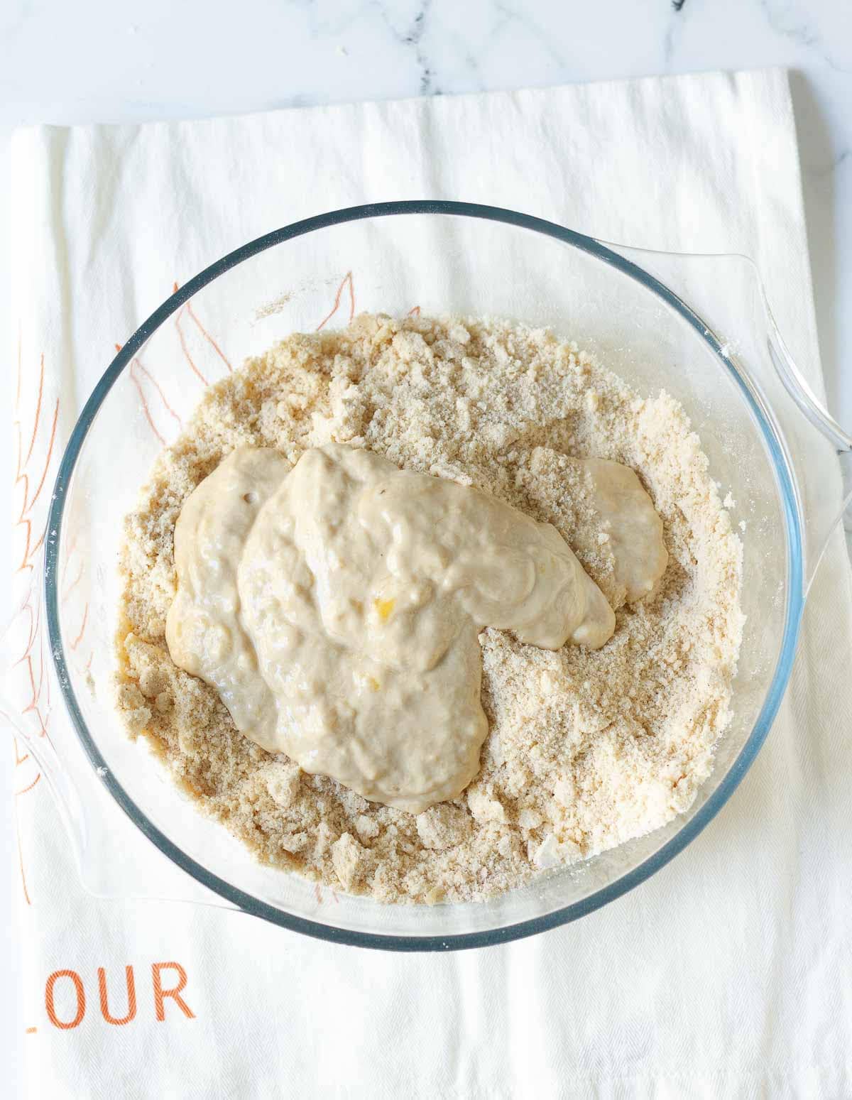 Dry and wet ingredients in a bowl.