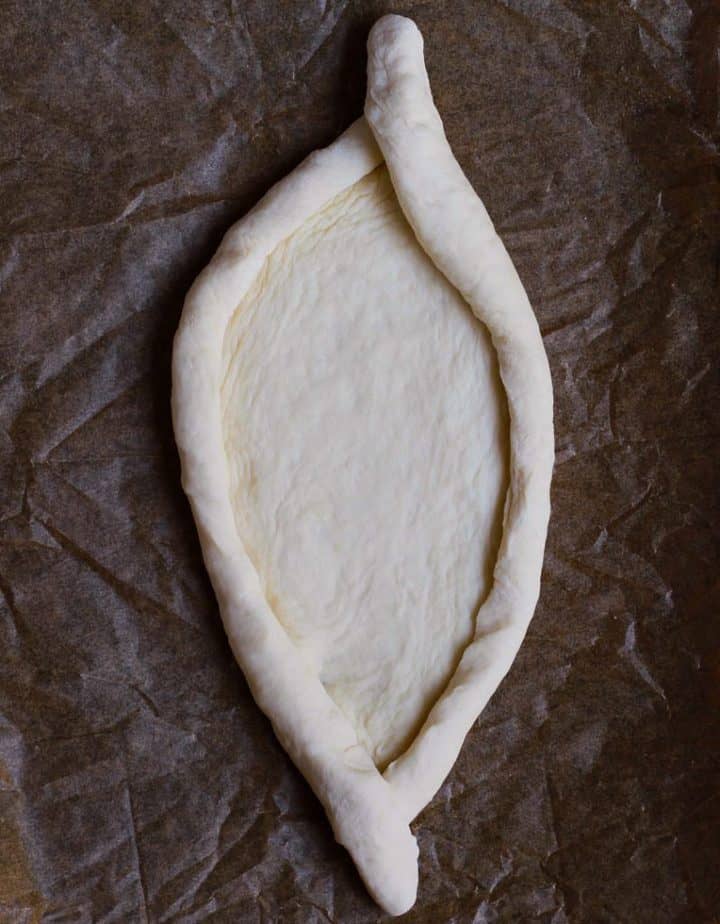 Shape the dough for Khachapuri- Georgian Cheese Bread
