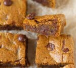 A blondie piece kept sideways to show gooey texture.
