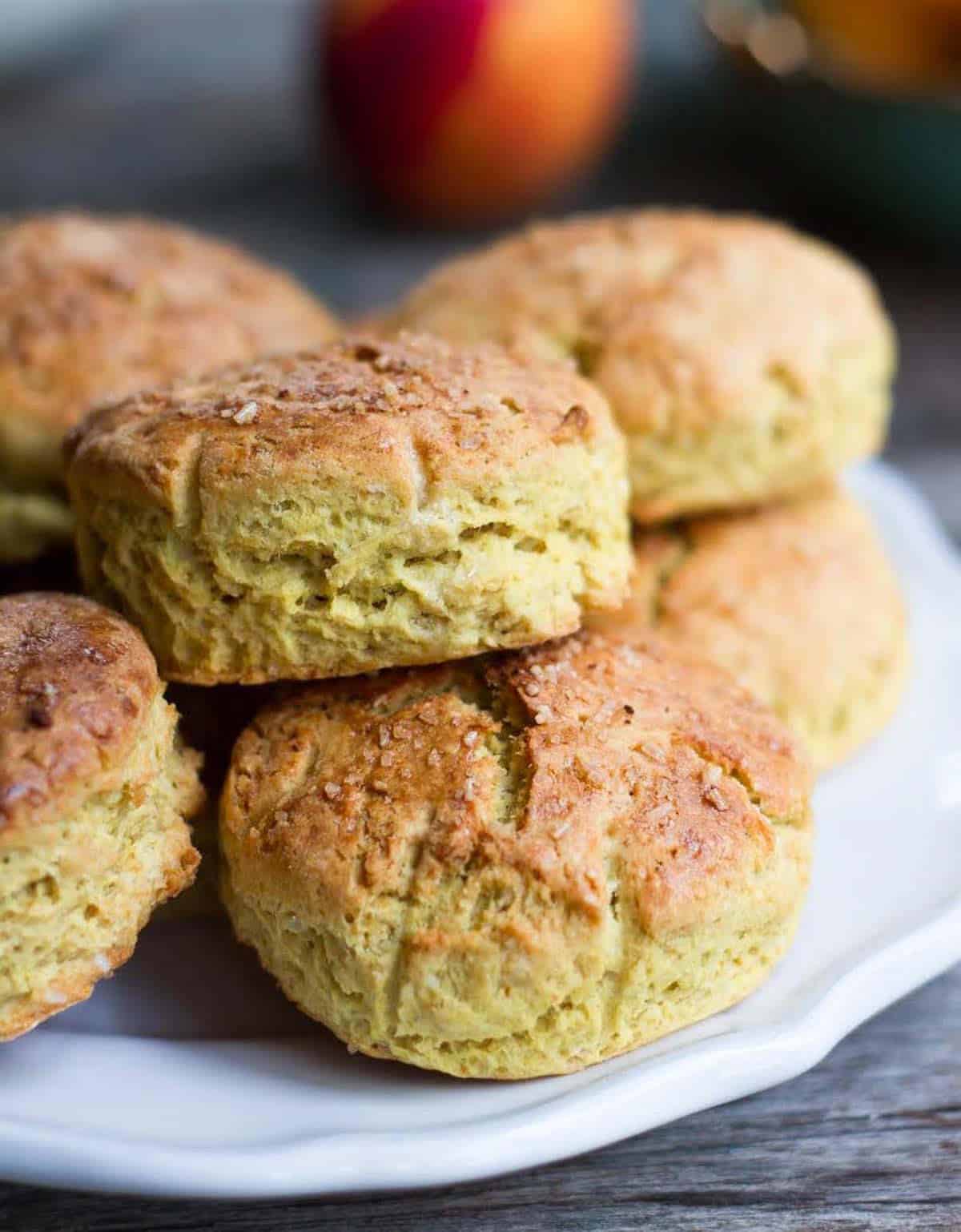 A plate stacked with biscuits.