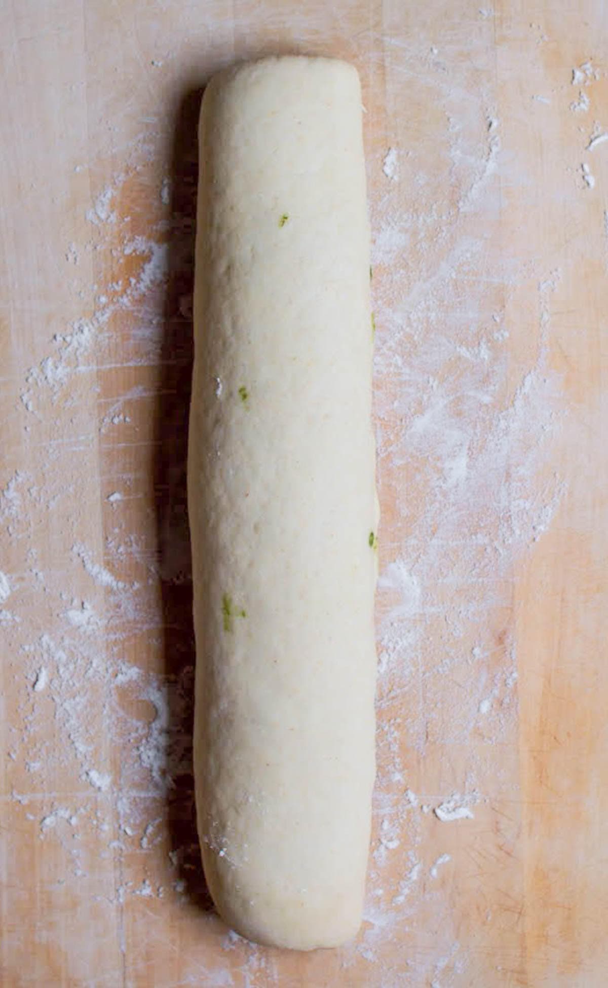 Dough rolled into a log.
