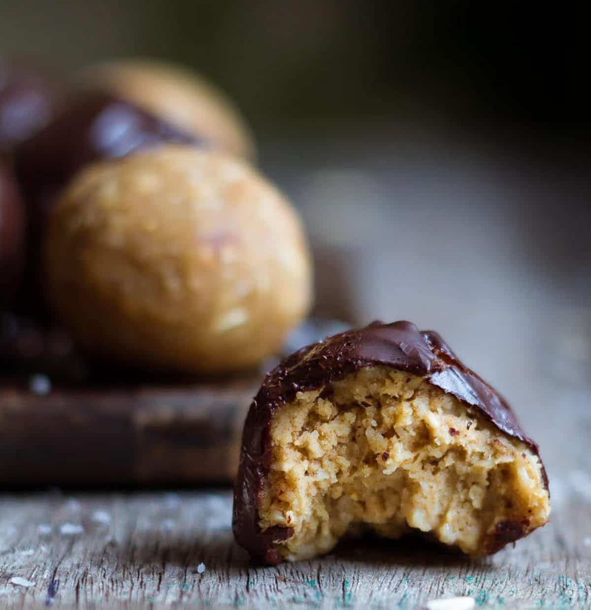 half eaten chocolate covered protein ball.