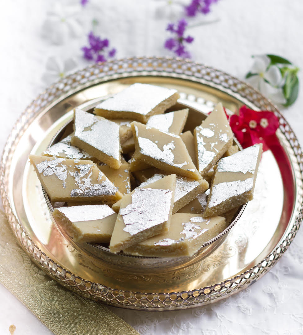 Kaju Katli on a silver serving tray.