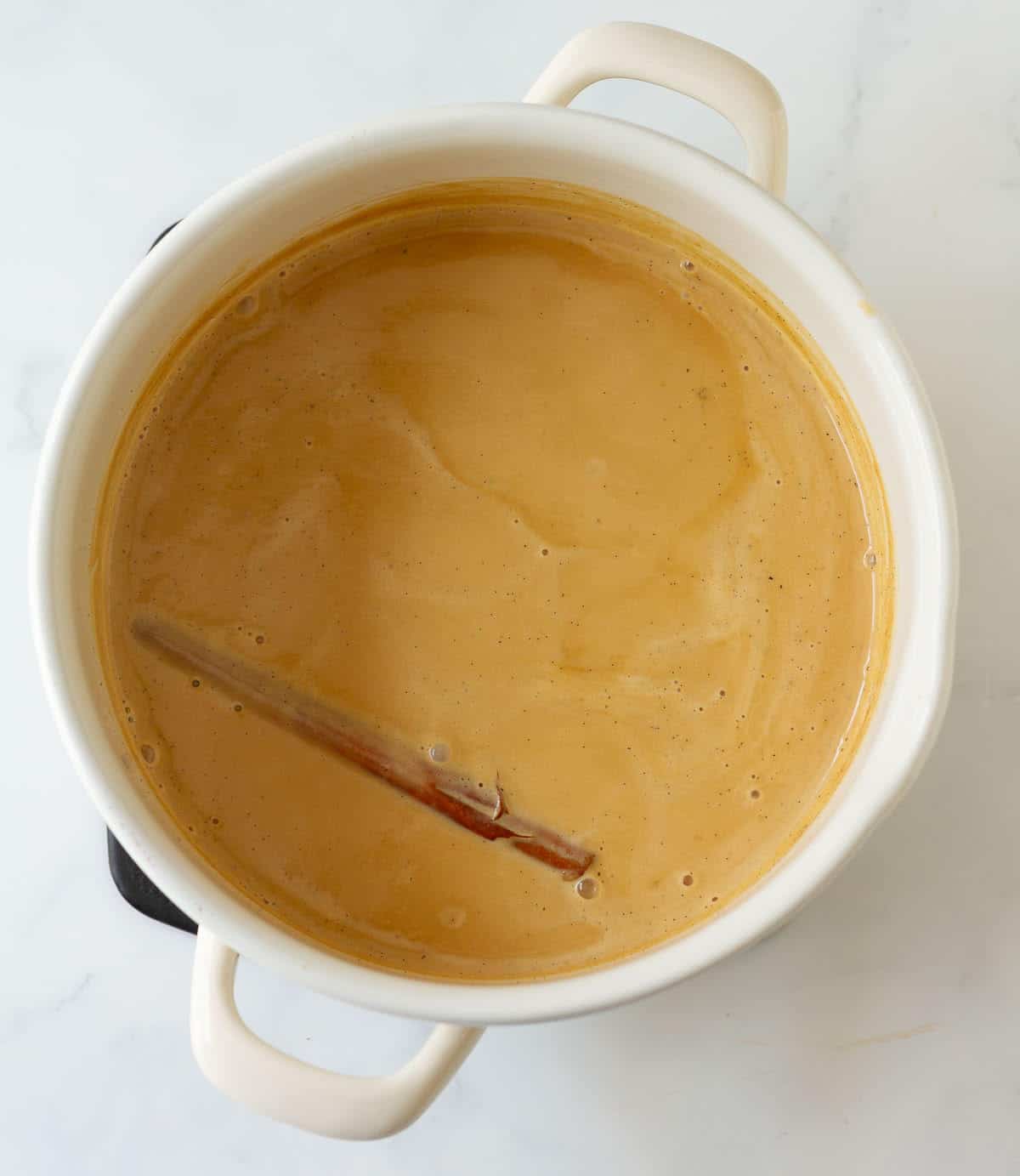Coffee cream mixture in a saucepan.