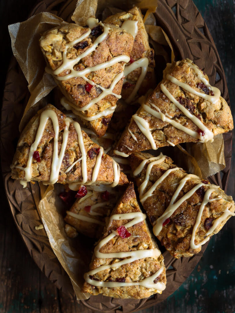 Apple cranberry scones in a wooden basket.