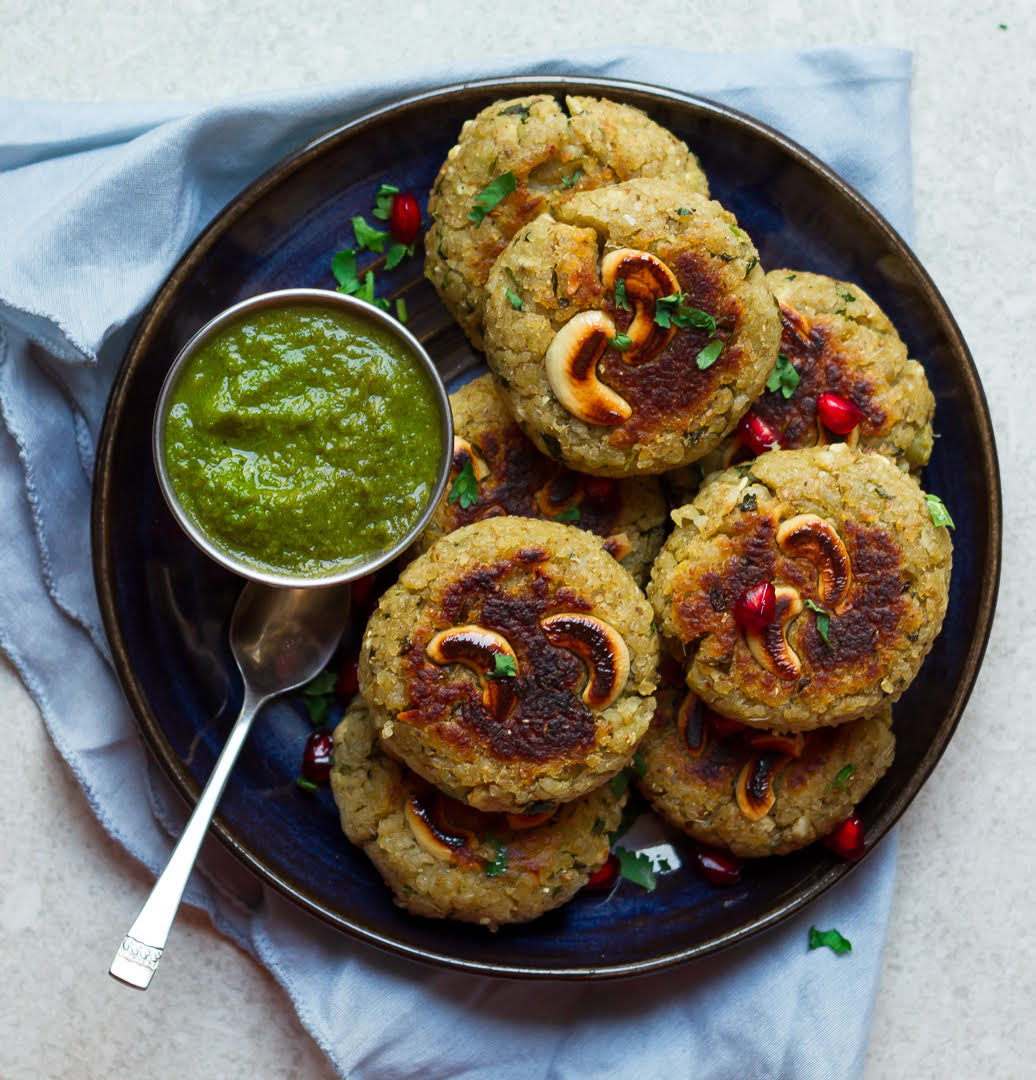 Sweet Potato Millet Cutlets with mint chutney on a plate.