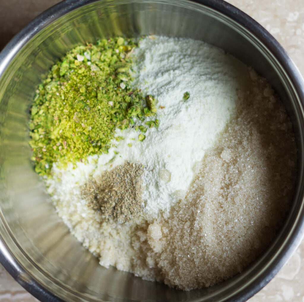 Dry ingredients for Cardamom Pistachio Madeleines | Easy Eggless Madeleine Recipe