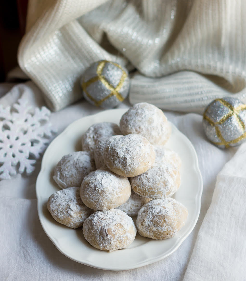 eggless mexican wedding cookies on a white platter.