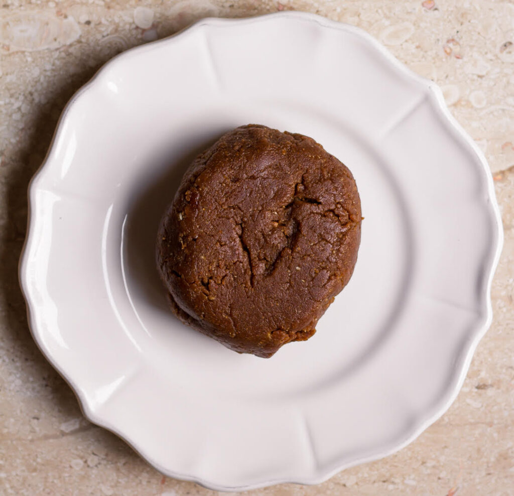 cookie dough on a white plate.