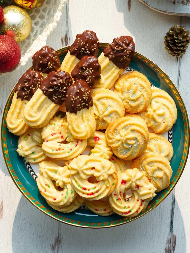 spritz cookies topped with sprinkles
