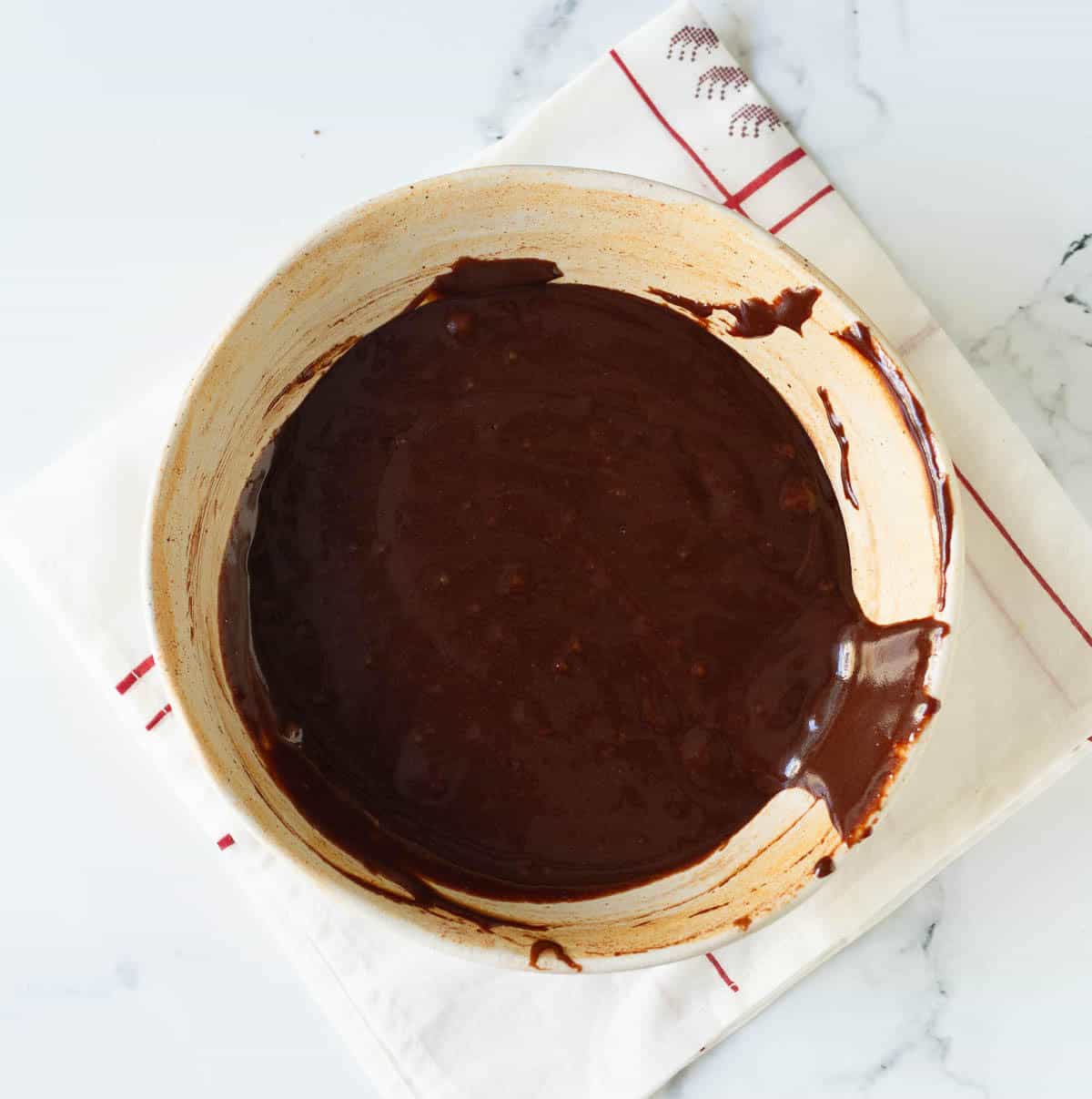 Chocolate cake batter in a bowl.
