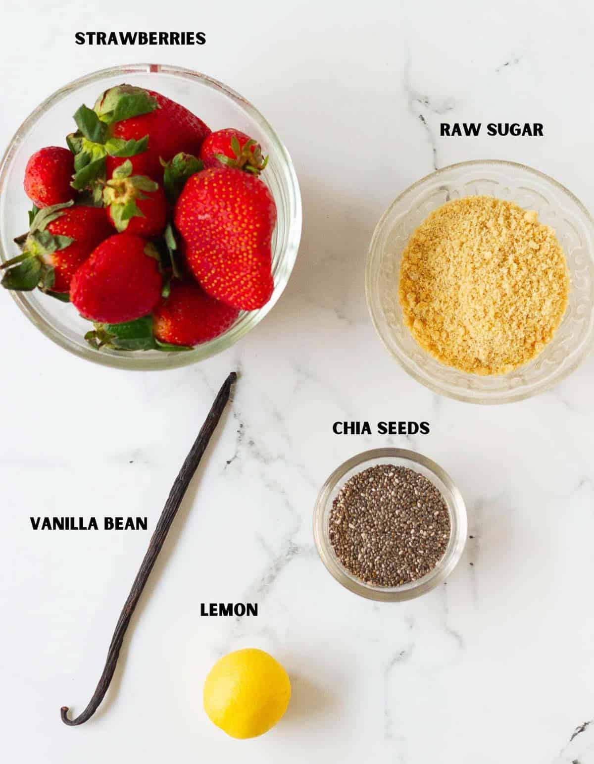 Ingredients for making strawberry chia jam.