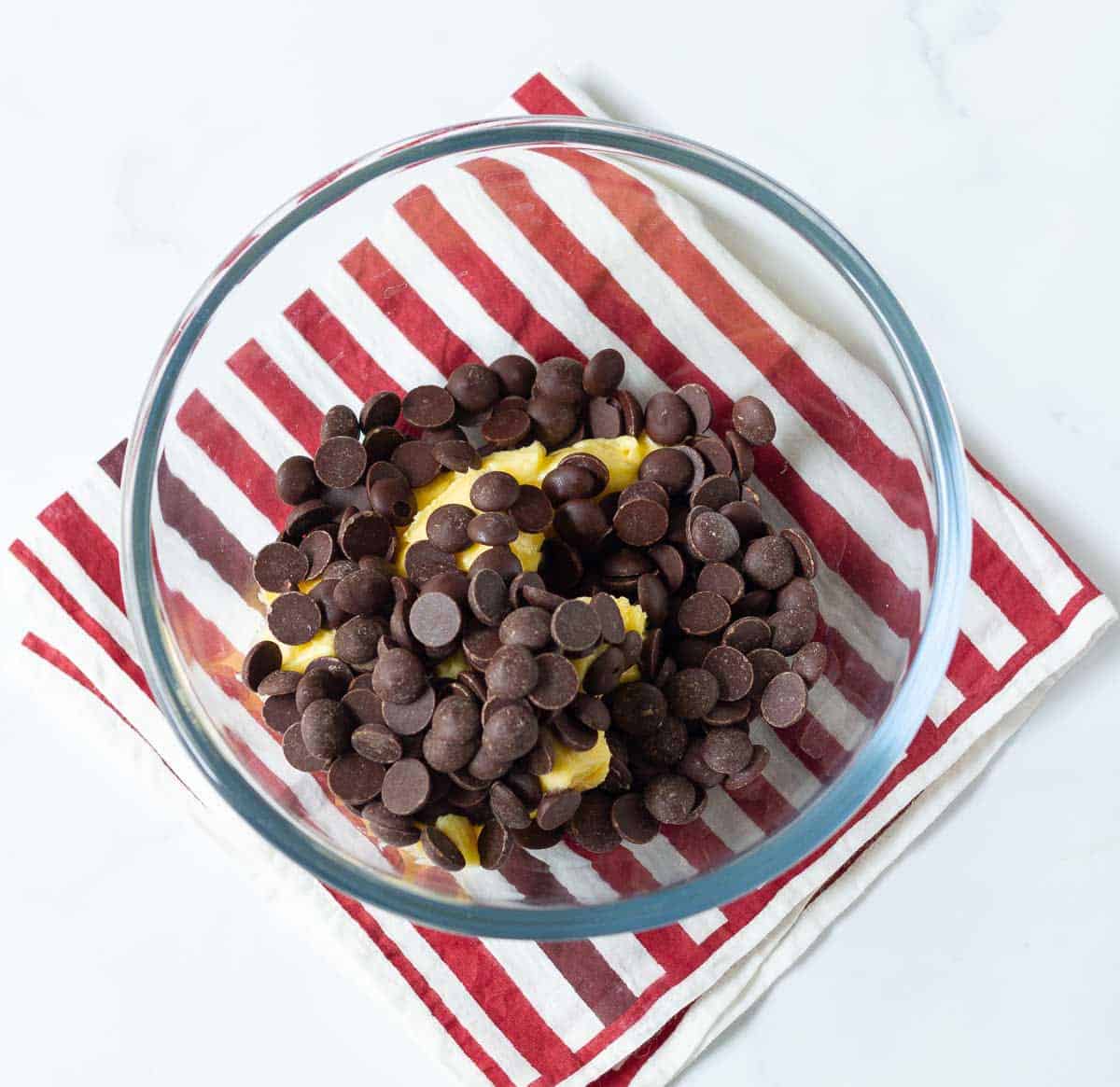 Chocolate and butter in a mixing bowl.