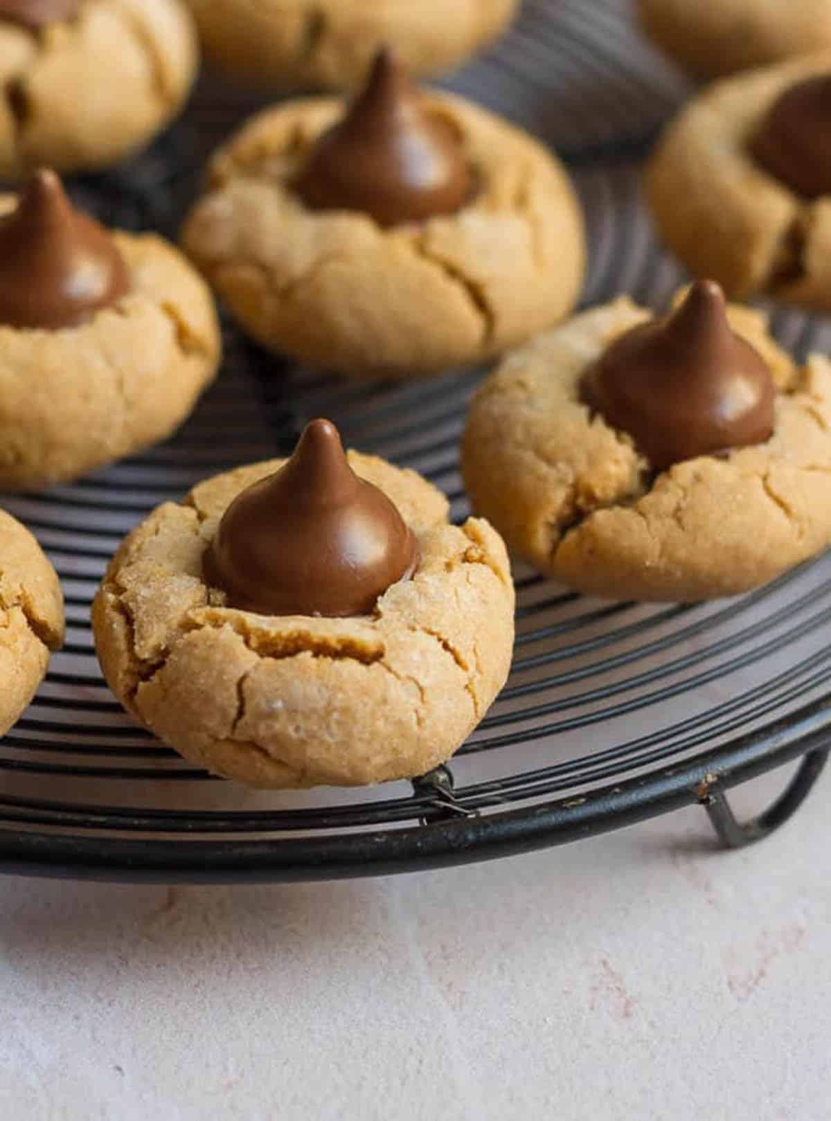 peanut butter cookies on a metal trivet.