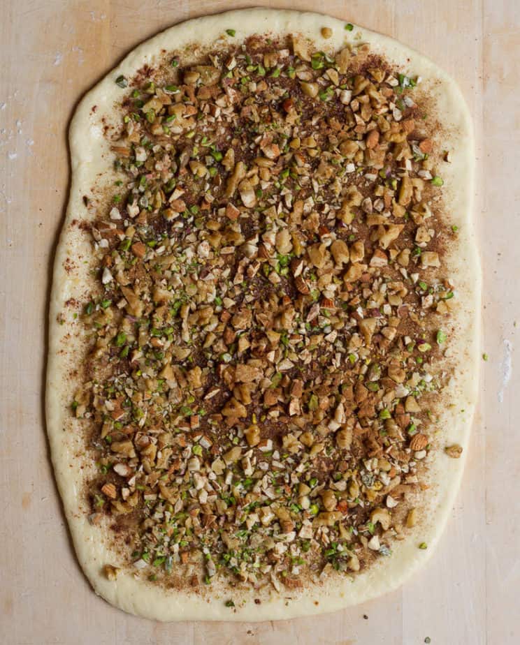 Rolled out dough for making Ready dough for Baklava Cinnamon Rolls | Eggless easy cinnamon rolls with baklava flavors