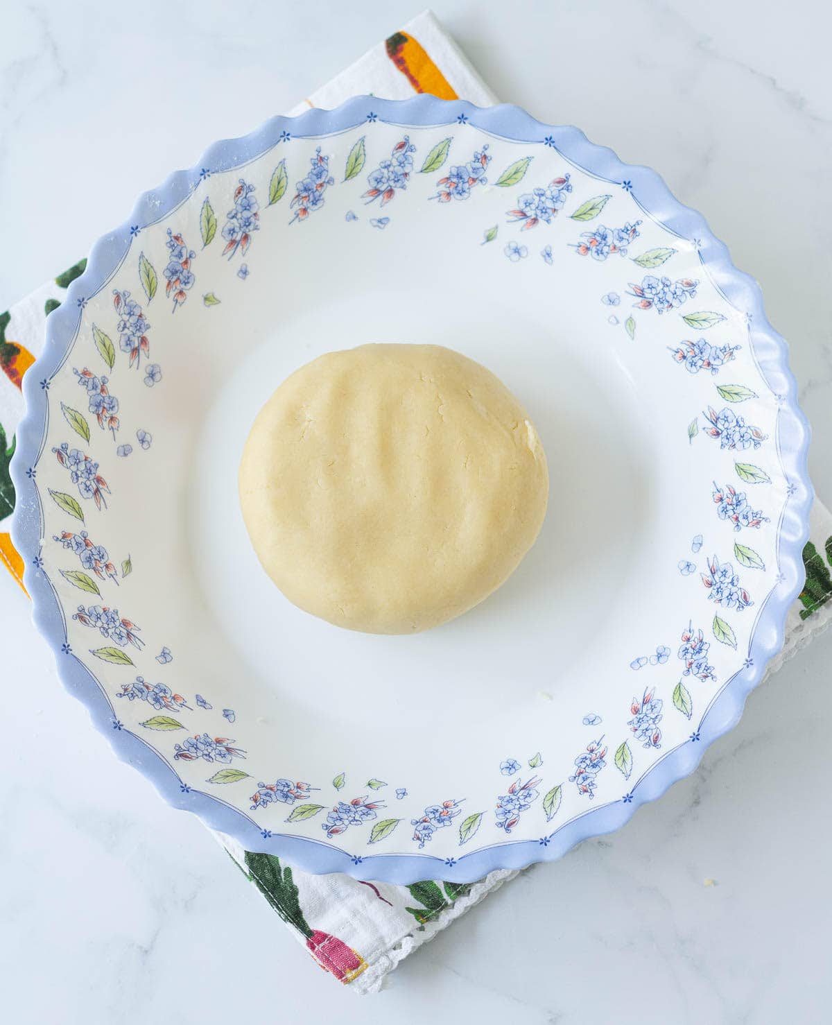 Pastry dough in a bowl.