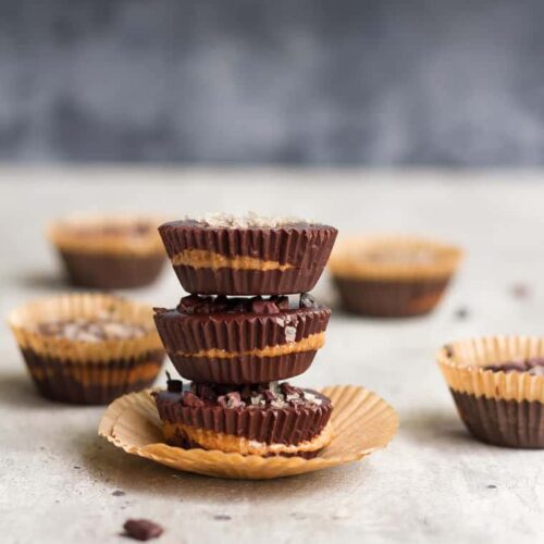 3 Almond Butter Cups stacked on top of each other.