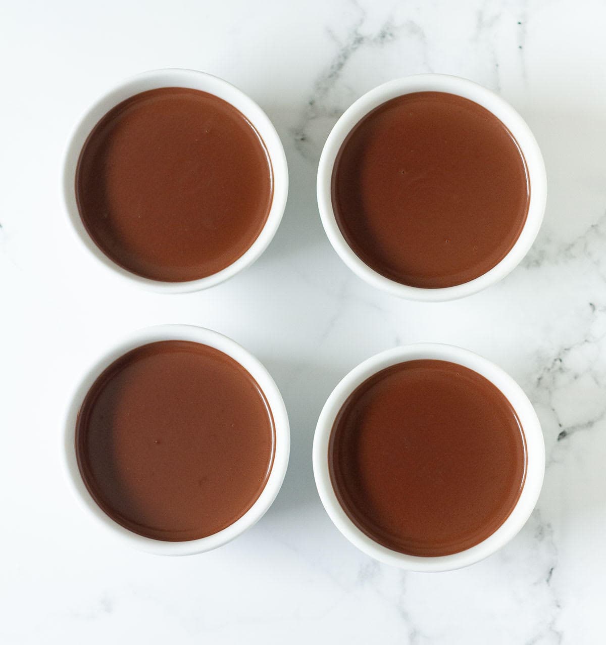 4 bowls of chocolate peanut butter pudding.