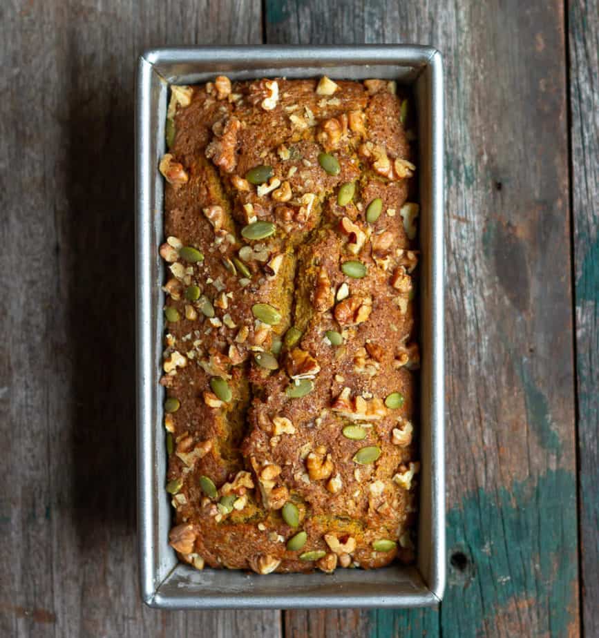 Baked pumpkin bread in a loaf pan.