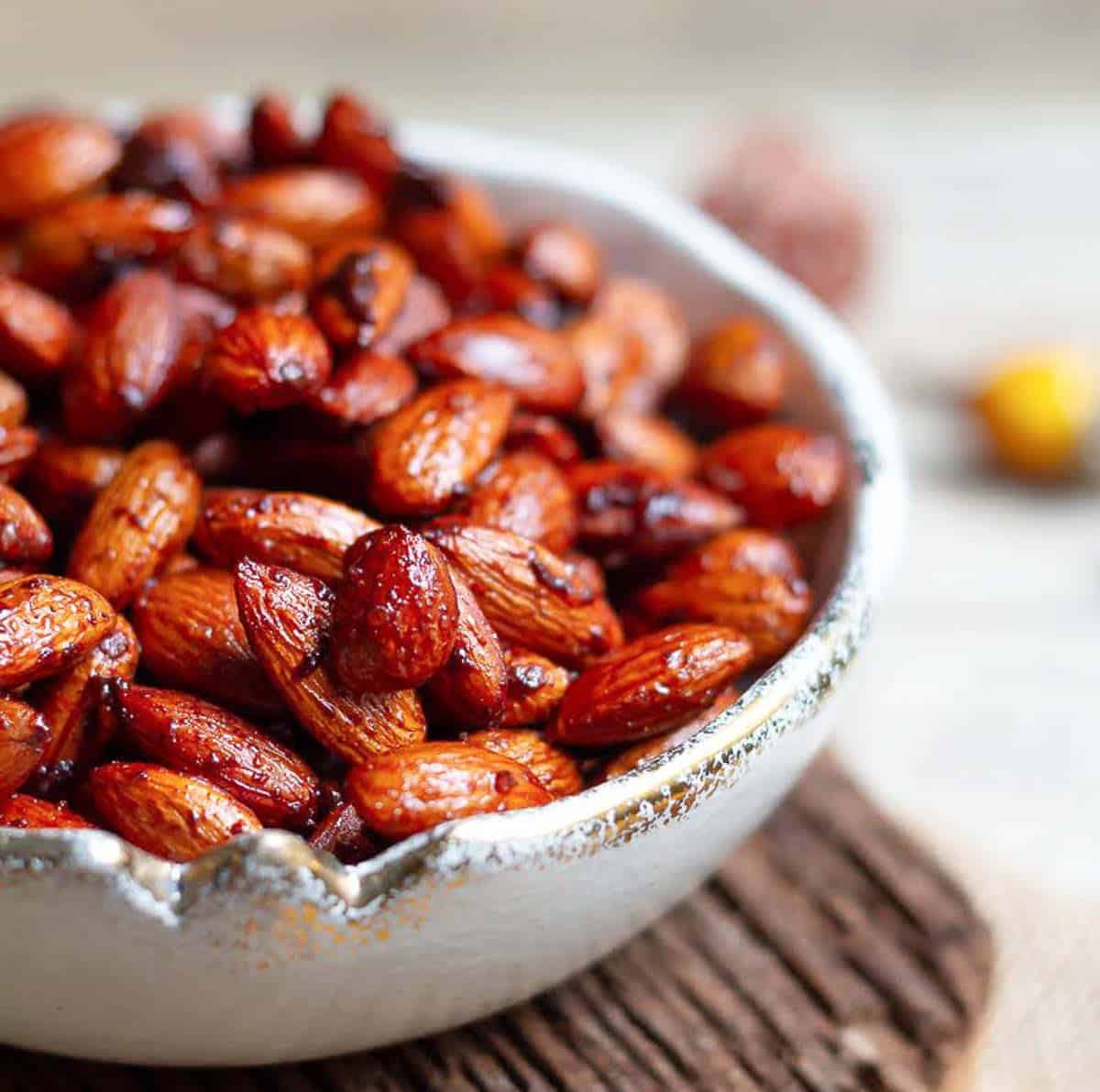 A bowl of spiced roasted almonds.