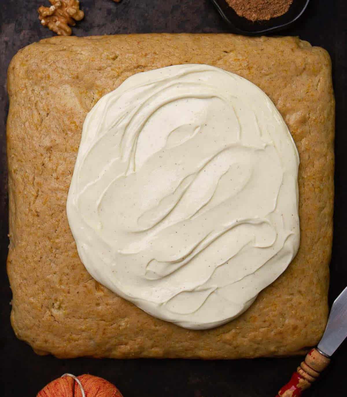 Cream cheese frosting on cake.