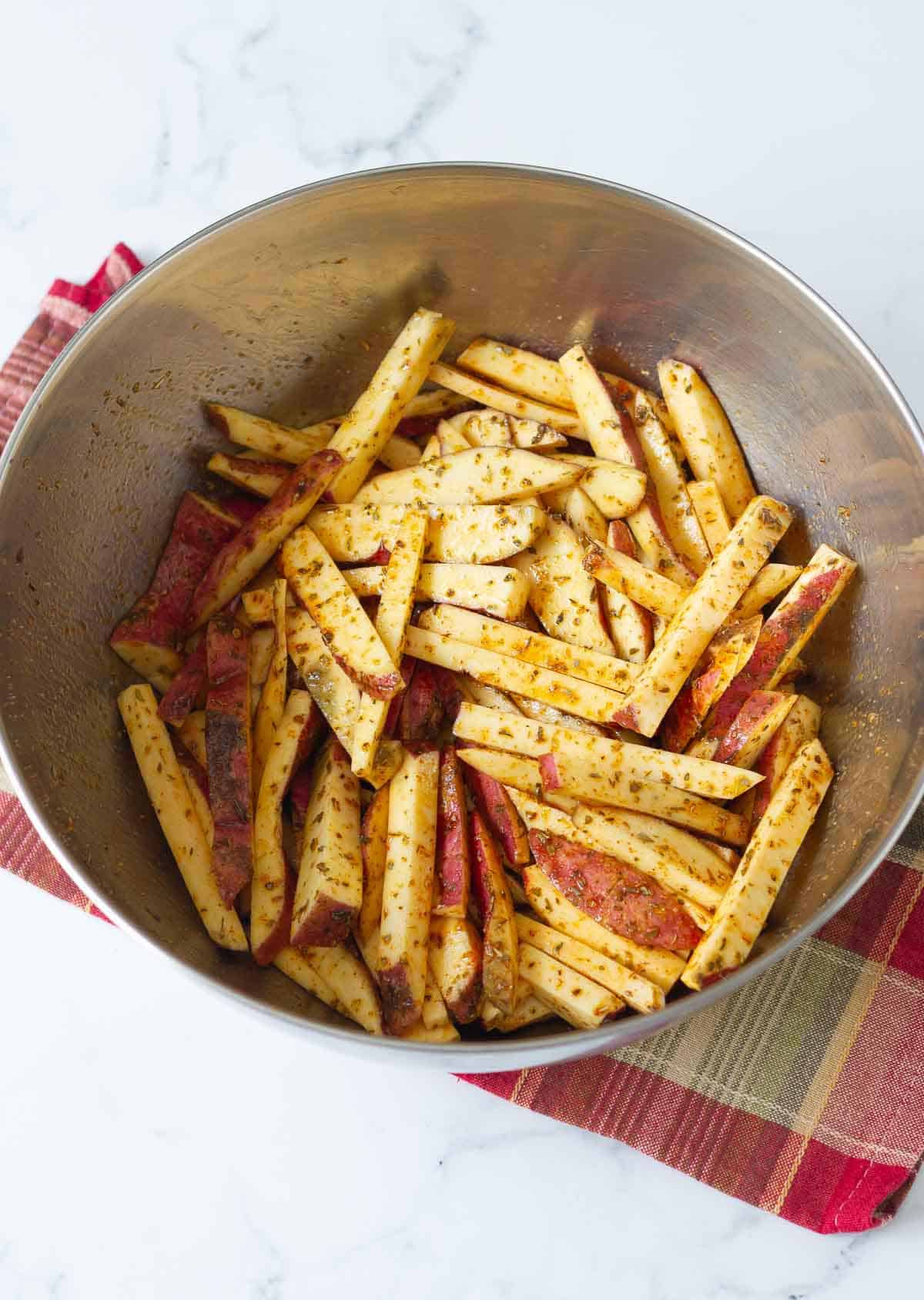 Sweet potato sticks coated with spices.