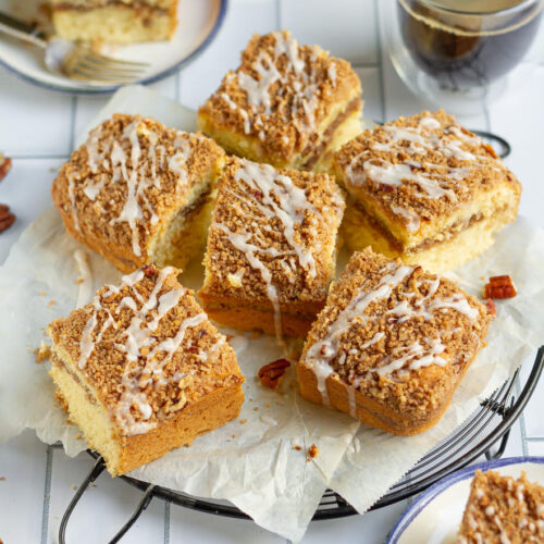 cinnamon streusel coffee cake squares on a wire rack.